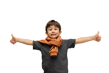 Image showing Happy caucasian little boy isolated on white studio background. Looks happy, cheerful, sincere. Copyspace. Childhood, education, emotions concept