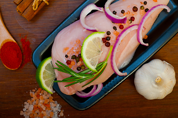 Image showing fresh organic chicken breast with herbs and spices