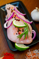 Image showing fresh organic chicken breast with herbs and spices