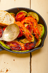 Image showing roasted shrimps with zucchini and tomatoes