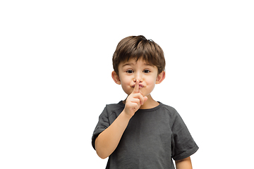 Image showing Happy caucasian little boy isolated on white studio background. Looks happy, cheerful, sincere. Copyspace. Childhood, education, emotions concept