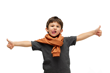 Image showing Happy caucasian little boy isolated on white studio background. Looks happy, cheerful, sincere. Copyspace. Childhood, education, emotions concept