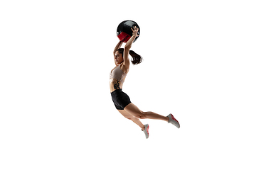 Image showing Caucasian professional female athlete training isolated on white studio background. Muscular, sportive woman.