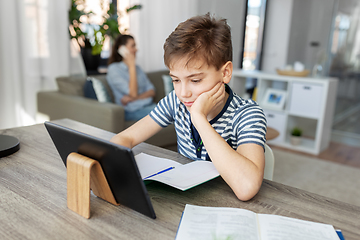 Image showing student boy with tablet computer learning at home