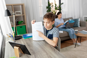 Image showing student boy with tablet computer learning at home