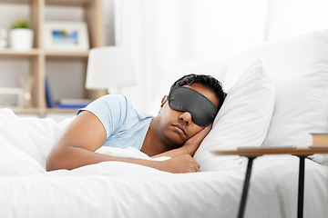 Image showing indian man in eye mask sleeping in bed at home