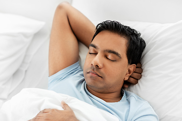 Image showing indian man sleeping in bed at home