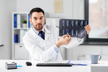 Image showing doctor with x-ray having video call at clinic