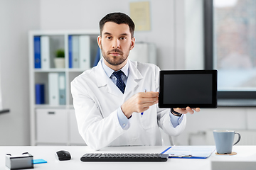 Image showing doctor with tablet pc having video call at clinic