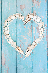Image showing Heart Shaped Seashell Wreath on Rustic Wood