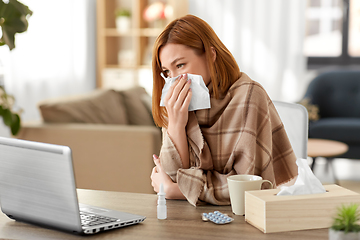 Image showing sick woman having video call on tablet pc at home