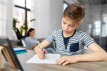 Image showing student boy with tablet computer learning at home