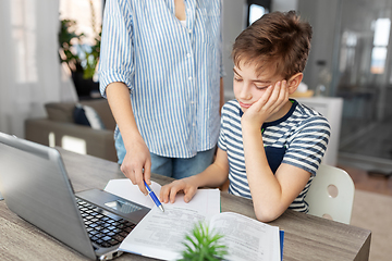 Image showing mother and son doing homework together