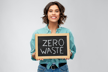 Image showing happy woman with chalkboard with zero waste words