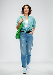 Image showing woman with reusable canvas bag for food shopping