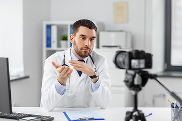 Image showing male doctor recording video blog at hospital