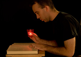 Image showing Reading By Candlelight