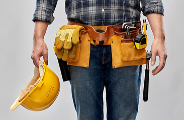 Image showing worker or builder with helmet and working tools