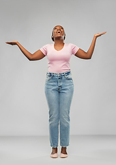 Image showing happy african american woman celebrating success