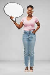 Image showing happy african american woman holding speech bubble