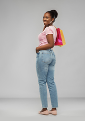 Image showing happy african american woman with shopping bags