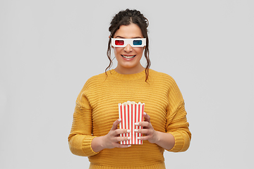 Image showing happy woman in 3d movie glasses with popcorn