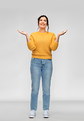 Image showing happy grateful woman looking up