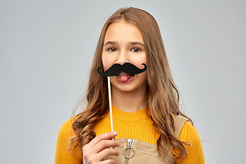 Image showing teenage girl with black moustaches party accessory