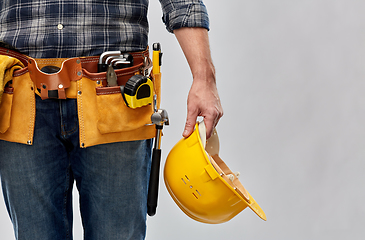 Image showing worker or builder with helmet and working tools