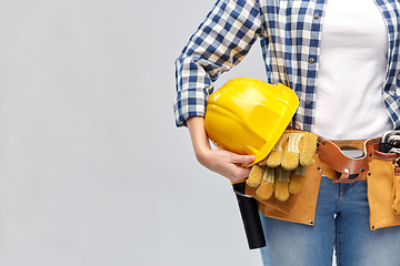 Image showing woman or builder with helmet and working tools