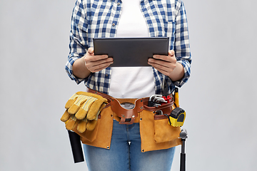 Image showing woman or builder with tablet pc and working tools