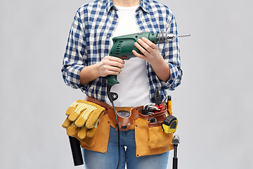 Image showing woman or builder with drill and work tools