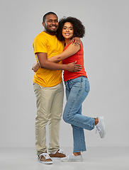 Image showing happy african american couple hugging