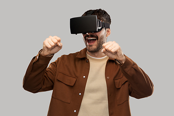 Image showing happy smiling young man in vr glasses