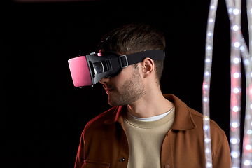 Image showing man in vr glasses over black background