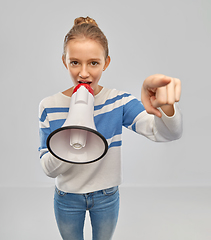 Image showing teenage girl speaking to megaphone