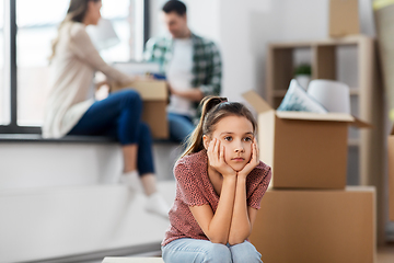 Image showing sad girl moving to new home with her family