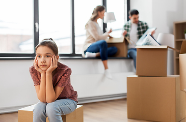 Image showing sad girl moving to new home with her family