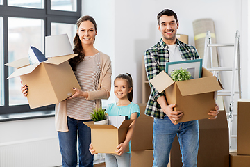 Image showing happy family with child moving to new home