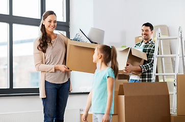 Image showing happy family with child moving to new home