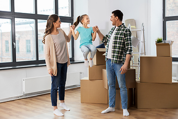 Image showing happy family with child moving to new home