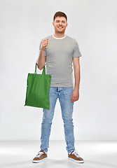 Image showing man with reusable canvas bag for food shopping