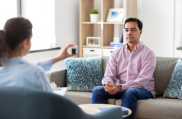 Image showing man and psychologist at psychotherapy session