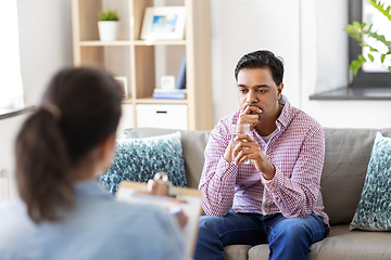 Image showing man and psychologist at psychotherapy session