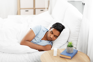 Image showing indian man sleeping in bed at home