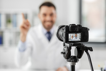Image showing male doctor recording video blog at hospital