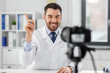 Image showing male doctor recording video blog at hospital