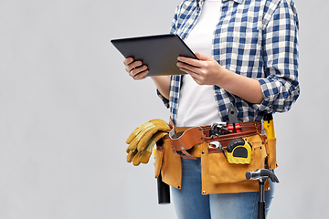 Image showing woman or builder with tablet pc and working tools