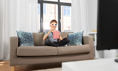 Image showing boy in 3d movie glasses and watching tv at home