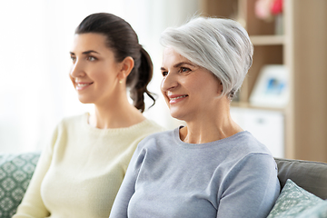 Image showing portrait of old mother and adult daughter at home